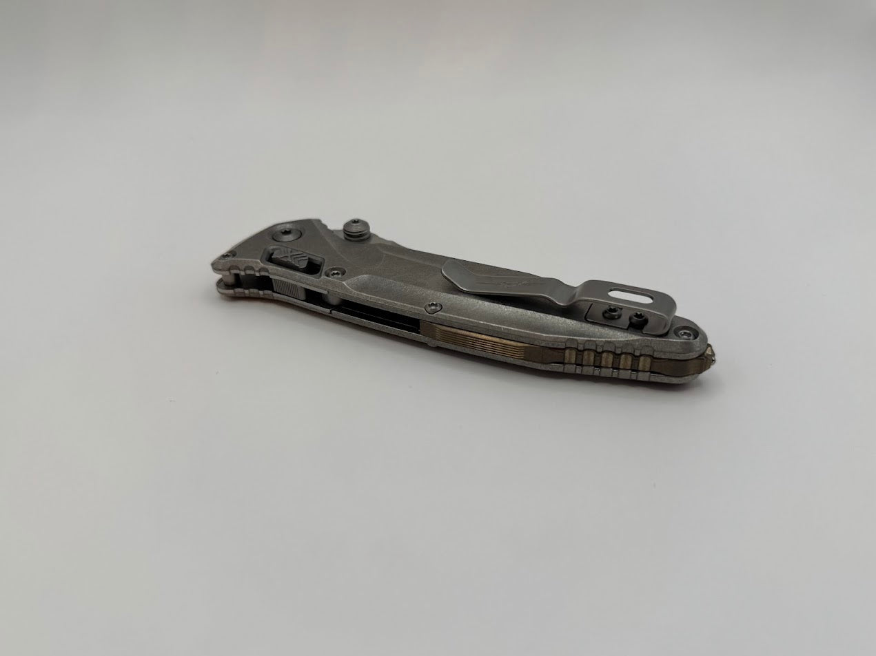 SOCOM DELTA RAM-LOK SPEAR POINT MARFIONE SELECT STONEWASH FINISH STONEWASH FINISH TITANIUM W/ BRONZE TITIANIUM ACCENTS DOUBLE VAPOR BLAST STAINLESS