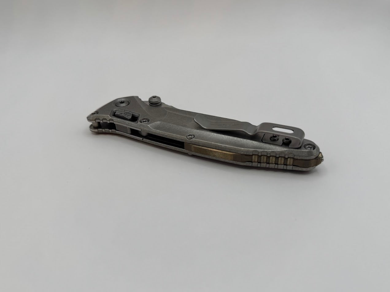 SOCOM DELTA RAM-LOK SPEAR POINT MARFIONE SELECT STONEWASH FINISH STONEWASH FINISH TITANIUM W/ BRONZE TITIANIUM ACCENTS DOUBLE VAPOR BLAST STAINLESS